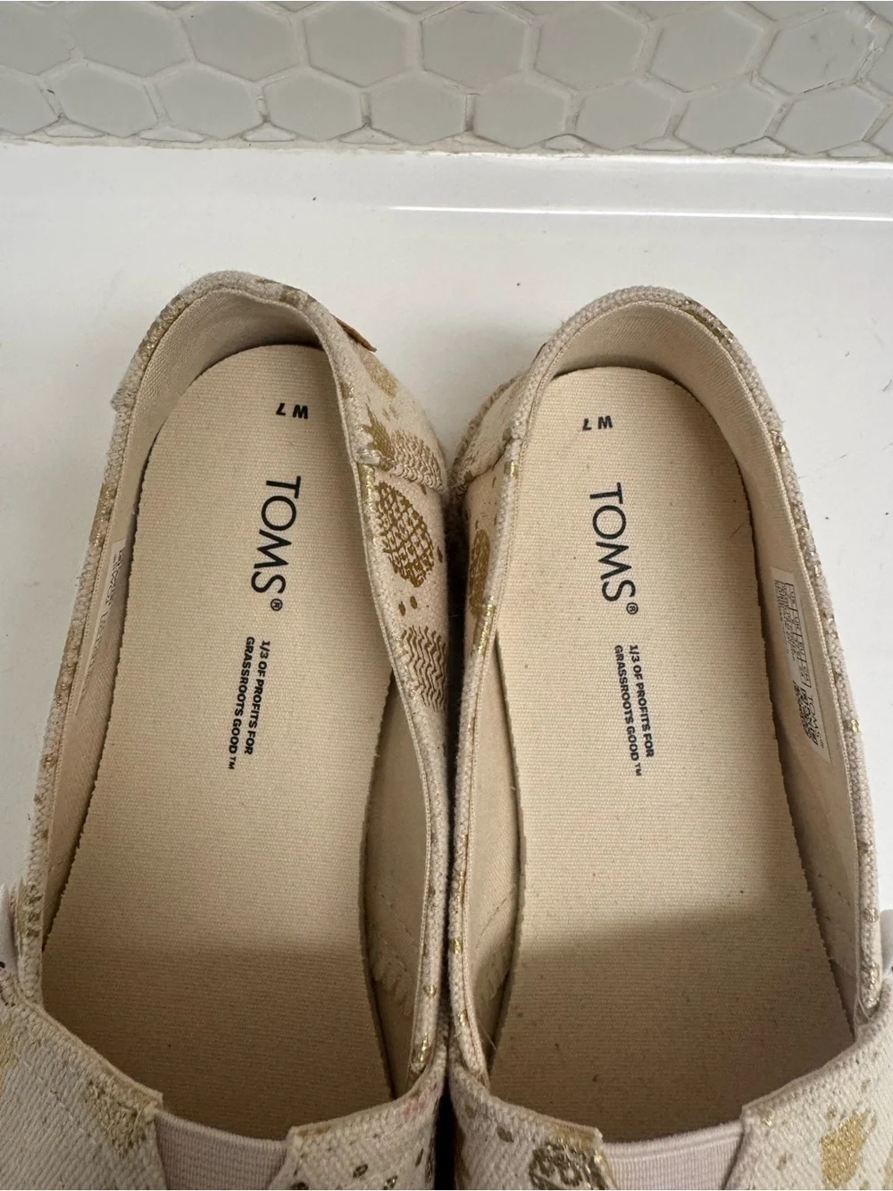 TOMS Cream Espadrille Slip-Ons with Metallic Gold Pineapple Motif